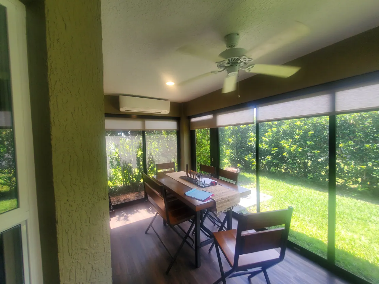 The covered dining area inside the enclosure.